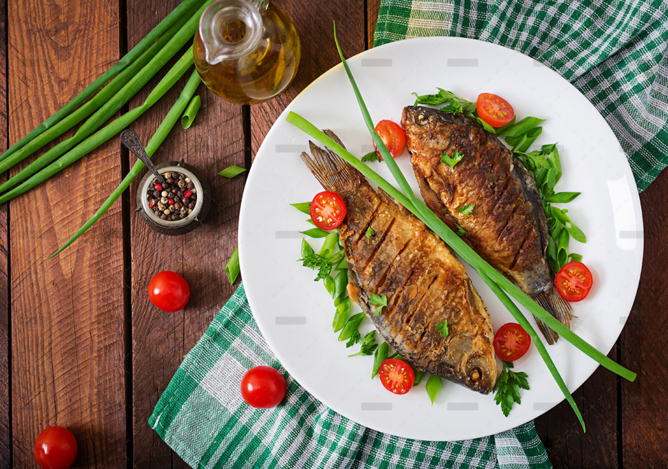 demo-attachment-508-fried-fish-carp-and-fresh-vegetable-salad-on-PG3PJT3-copy